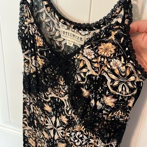 Black slip dress with lace detail and boho print